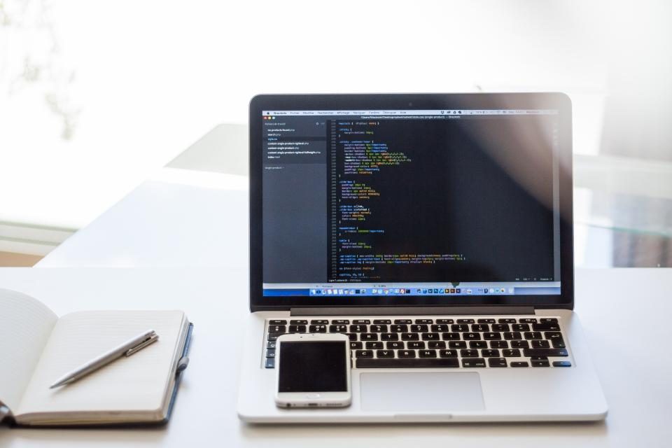 Illustrative photograph of macbook Laptop